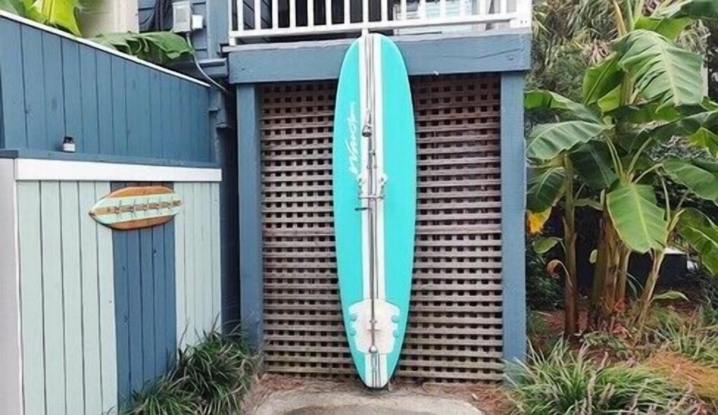 Surfboard shower and outdoor details at The Folliday Inn