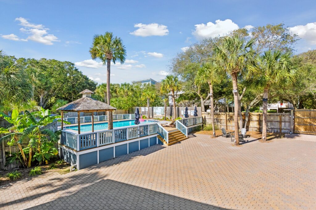 Pool deck and gardens at The Folliday Inn