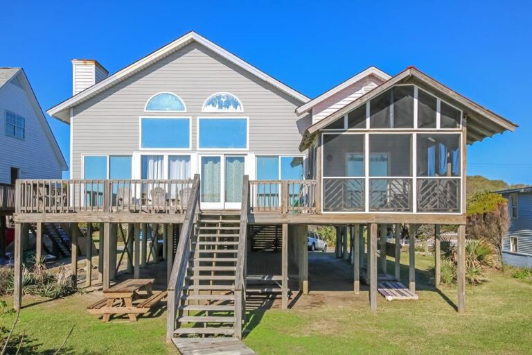 Raised beach house with a screened porch on Folly Beach
