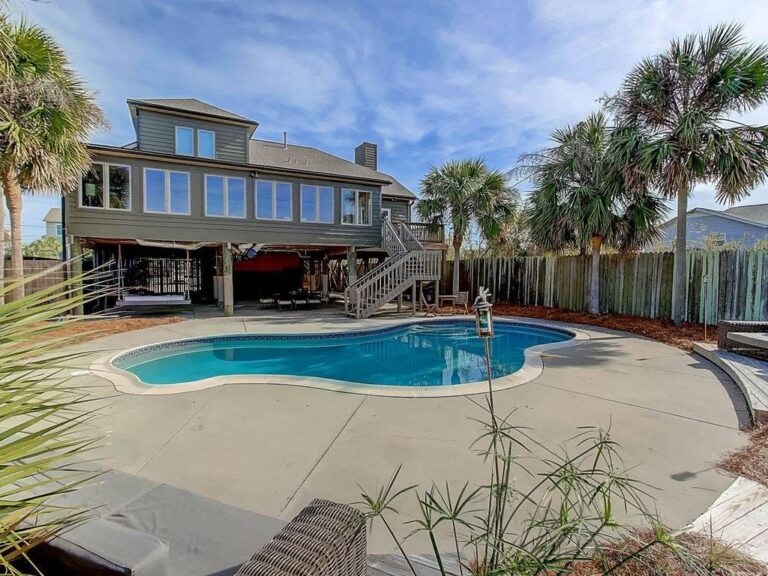 Pool and patio at a Folly Beach vacation home
