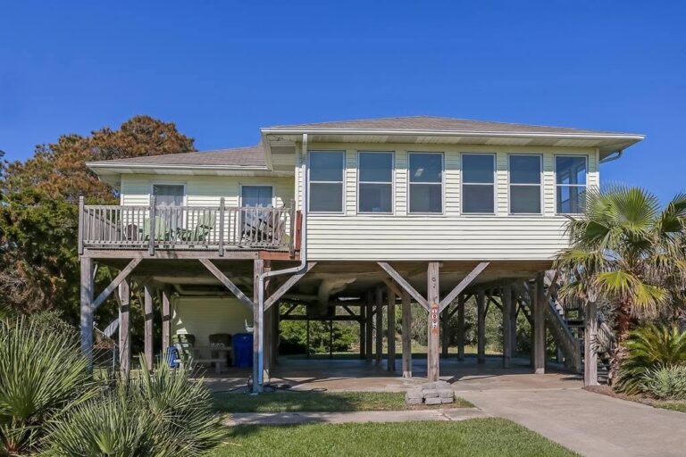 Raised Folly Beach beach house with wraparound decks