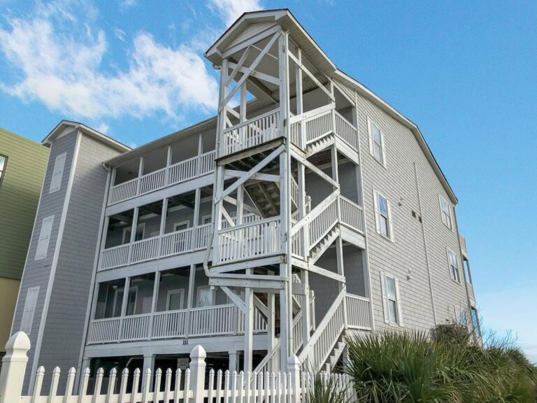 Condo building with stairs and balconies on Folly Beach