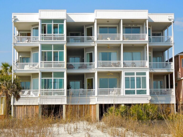Oceanfront condo building with balconies on Folly Beach