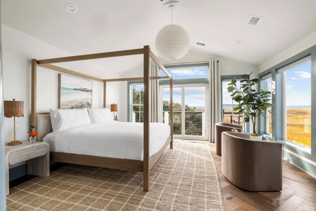 Guest room with water view at Regatta Inn