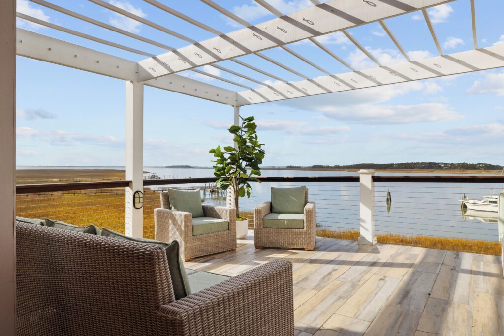 Deck with river views at Regatta Inn