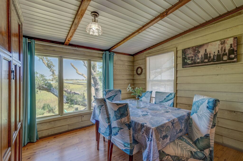 Sunroom dining area at Riverside Inn and Cottages
