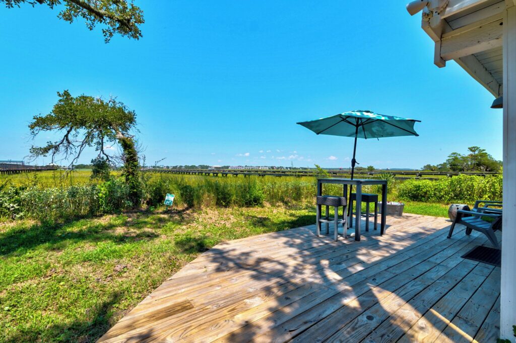 Deck overlooking the Folly River marsh at Riverside Inn