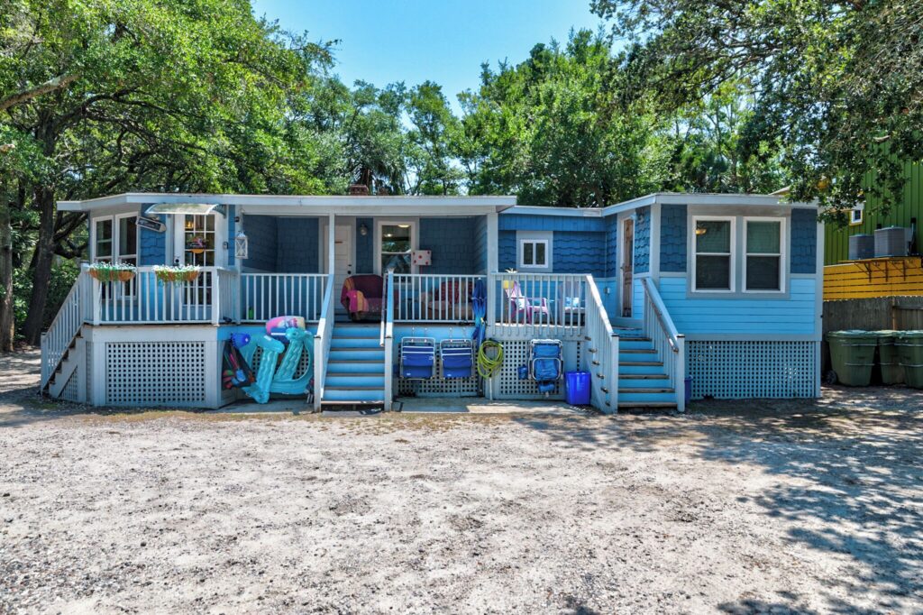 Blue cottage exterior at Riverside Inn and Cottages